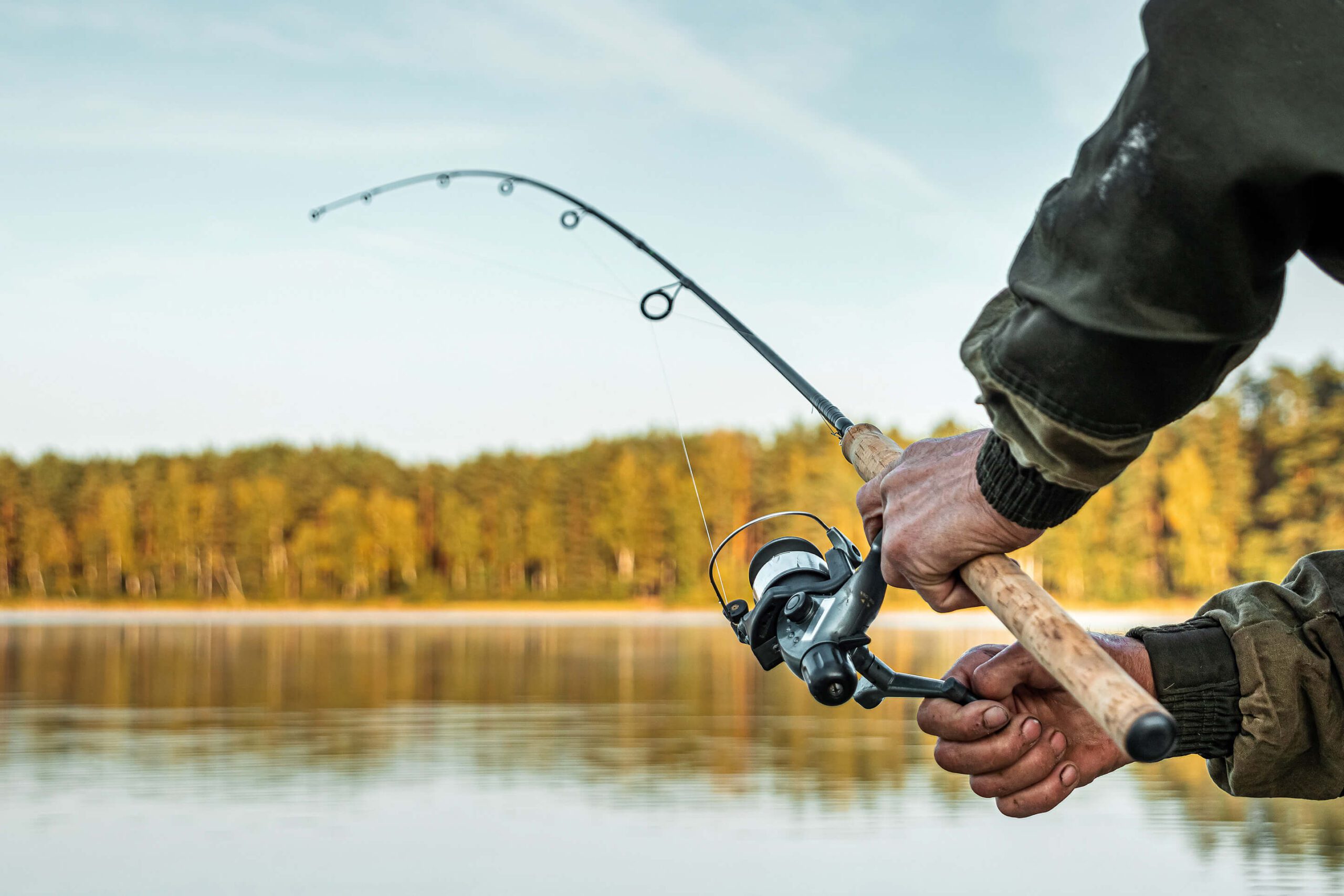 A man fishing on a river in West Virginia.