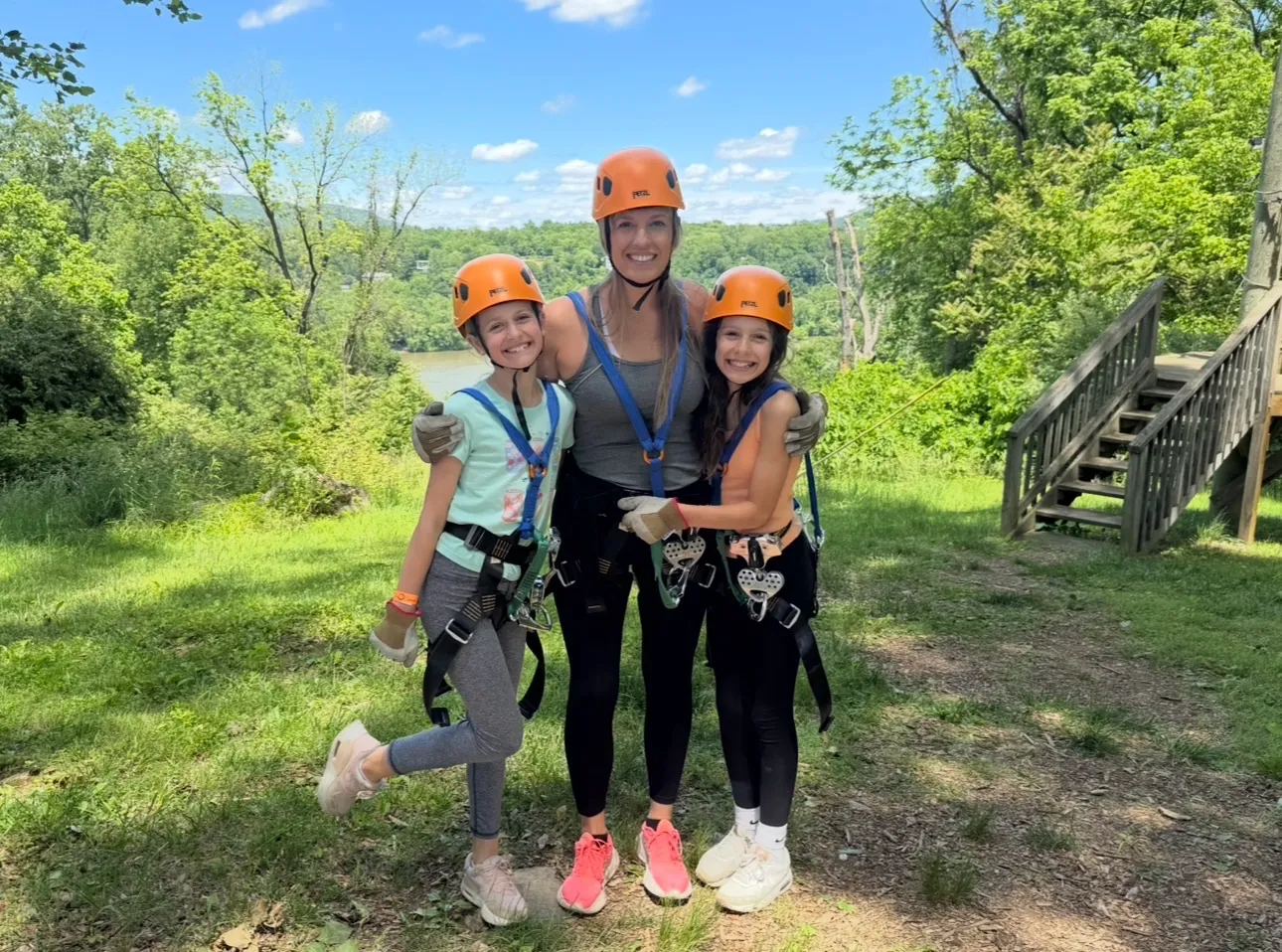 A mother and her two daughters after doing the ropes course at Harpers Ferry Adventure Center.